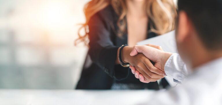 Businesswoman handshake and business people. Successful business concept.